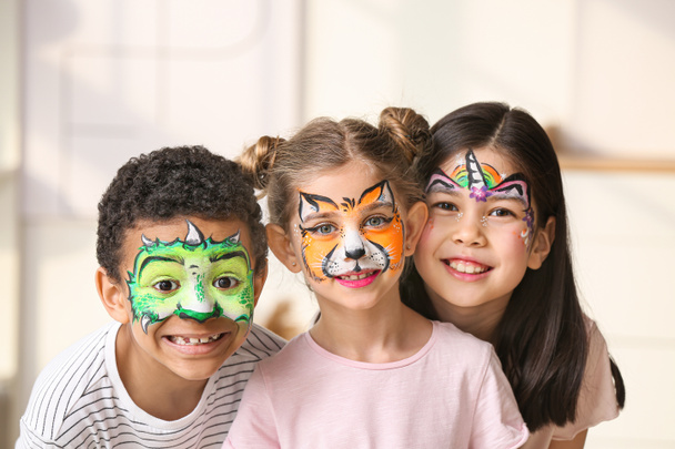 Funny little children with face painting at home - Photo, Image