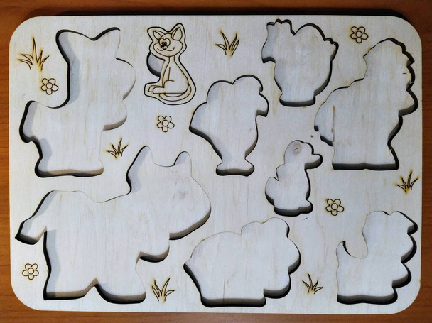 Wood board game with agricultural and home animals on wooden background - Foto, Bild