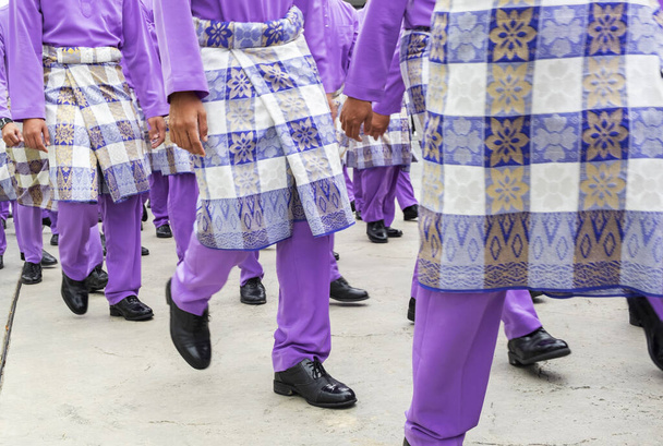 Malaio Homem em traje tradicional chamado BAJU MELAYU durante a cerimônia Maulidur Rasul
 - Foto, Imagem