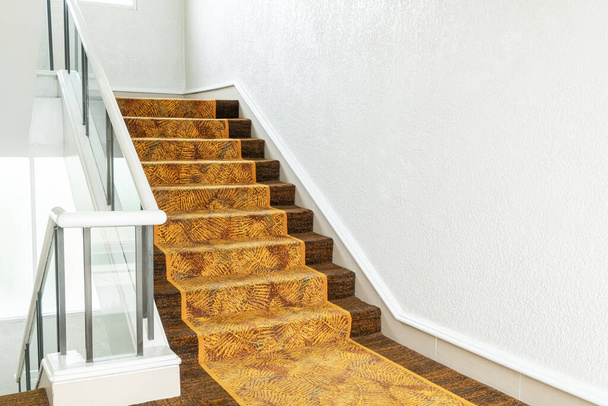 beautiful stair step with carpet in building - 写真・画像