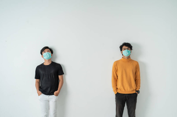social distancing. people with masks - Fotografie, Obrázek