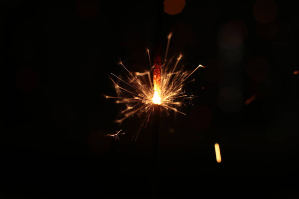 ünnepi égő csillagszóró makró fénykép - Fotó, kép