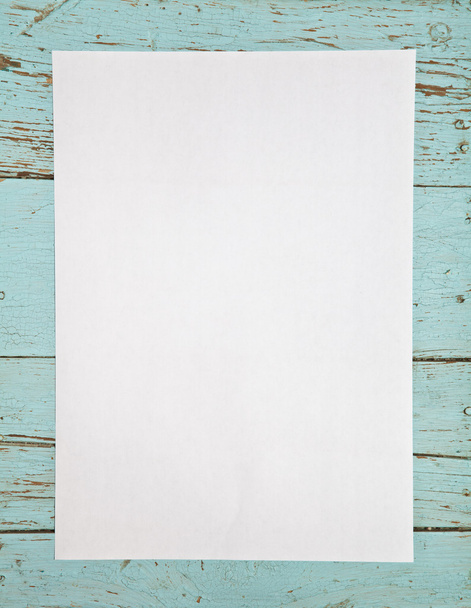 Sheet of white paper on the wooden background - 写真・画像