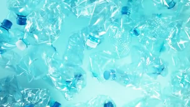 Super slow motion of empty plastic bottles flying into the air. Filmed on high speed cinema camera, 1000 fps. - Footage, Video