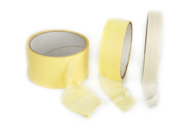 Three rolls of masking tapes on a white - Photo, Image
