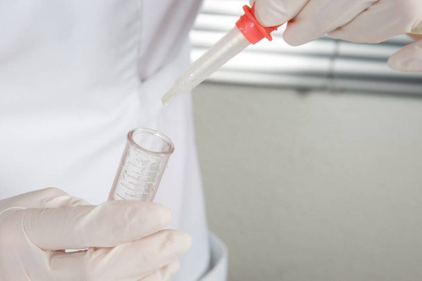 coronavirus covid-19 infected blood sample in sample tube chemistry experiment science at laboratory - Foto, Bild
