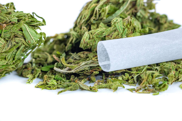 Pile of medical dried cannabis and marijuana isolated on white background, studio shoot - Photo, Image