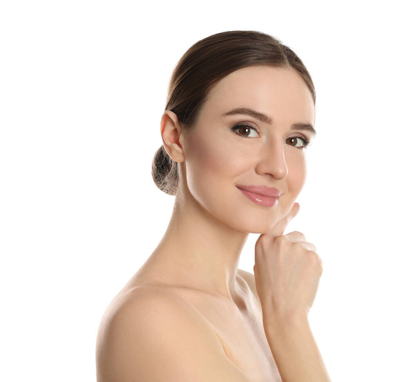 Portrait of young woman with beautiful face on white background - Fotó, kép