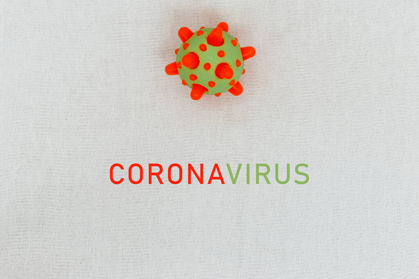 Abstract virus strain model of MERS-Cov or middle East respiratory syndrome coronavirus and Novel coronavirus 2019-nCoV with text on white (medical gauze) background. Virus Pandemic Protection Concept - Foto, afbeelding