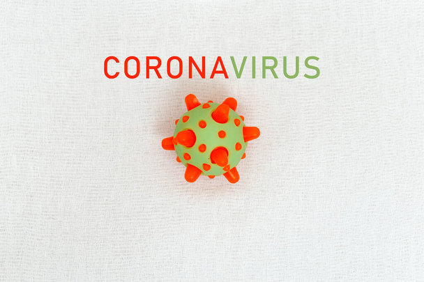 Abstract virus strain model of MERS-Cov or middle East respiratory syndrome coronavirus and Novel coronavirus 2019-nCoV with text on white (medical gauze) background. Virus Pandemic Protection Concept - Фото, зображення