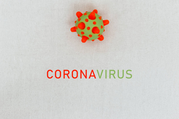 Abstract virus strain model of MERS-Cov or middle East respiratory syndrome coronavirus and Novel coronavirus 2019-nCoV with text on white (medical gauze) background. Virus Pandemic Protection Concept - Fotoğraf, Görsel
