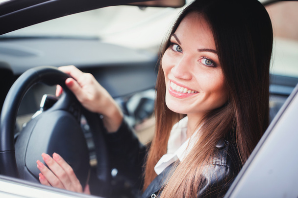 Woman driving the car - Photo, image