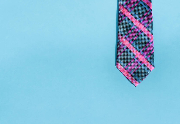 Fun design necktie in pink and blue colors background.  - Photo, Image