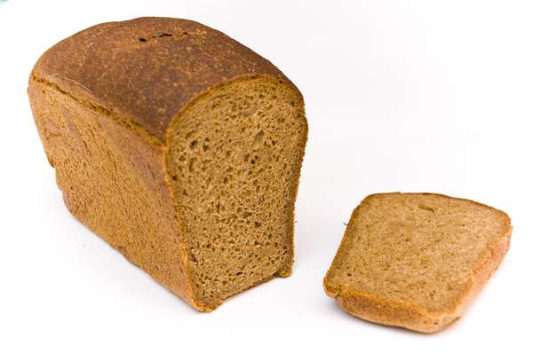 Loaf and cut off a chunk - Photo, Image