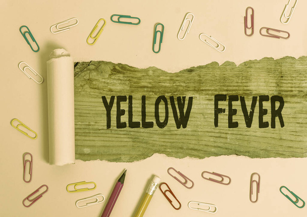 Writing note showing Yellow Fever. Business photo showcasing tropical virus disease affecting the liver and kidneys. - Photo, Image