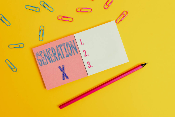Word writing text Generation X. Business concept for the generation that born after that of the baby boomers Colored square blank sticky notepads pencil clips plain color background. - Photo, Image