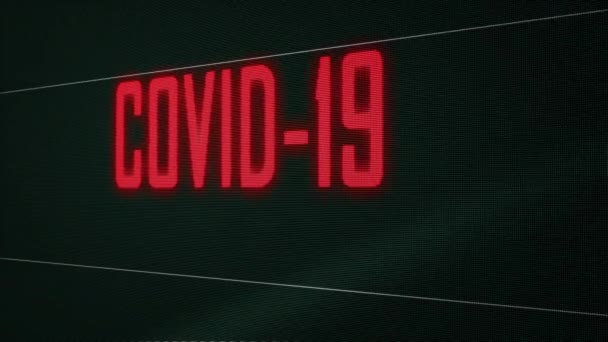 Closeup červená Coronavirus Covid-19 vypuknutí varování blikání text na počítači pixelated zelené obrazovce pozadí. 3D vykreslování abecedy. Zdravotní a lékařská koncepce. Zdravotní chřipka. 4K - Záběry, video