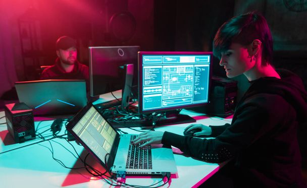 Hackers making cryptocurrency fraud using virus software and computer interface. Blockchain cyberattack, ddos and malware concept. Underground office background. - Zdjęcie, obraz