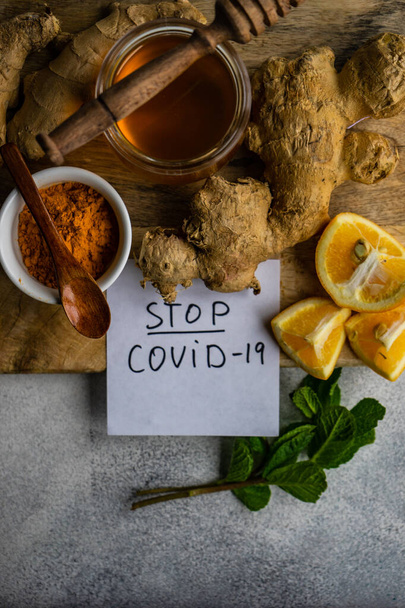 Ingredients for energy drink helping stay healthy with ginger, lemon, mint and turmeric - Фото, зображення
