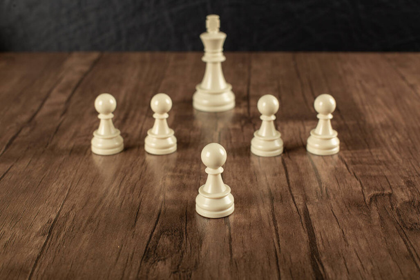 A white king and white pawns - Foto, imagen