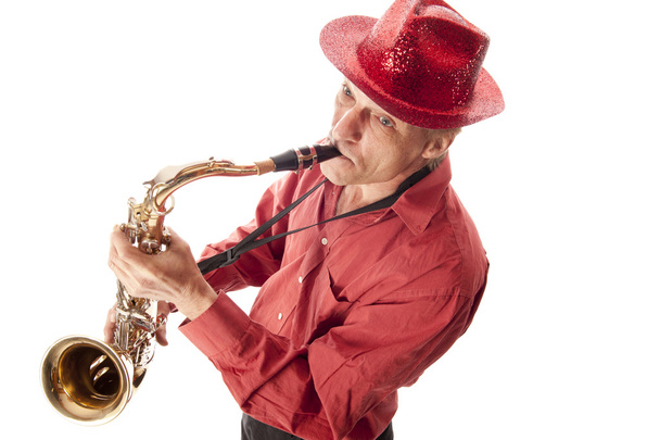 Man with hat playing saxophone - Photo, Image