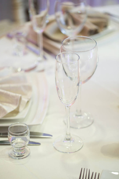 Beautifully set table in a restaurant for a Banquet. - 写真・画像