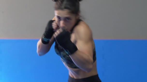 Professional woman is practicing shadow boxing - Footage, Video