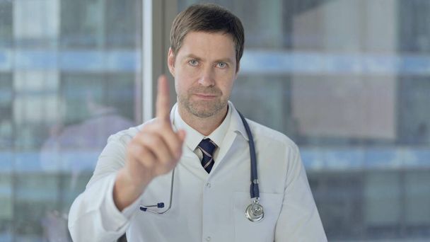 Serious Middle Aged Doctor Saying No with Finger Sign - Photo, Image