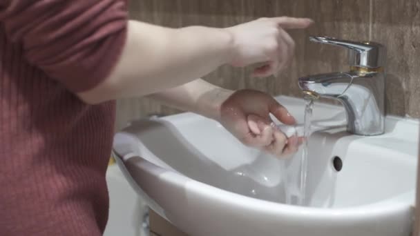 Wash your hands thoroughly with soap and a water jet. - Footage, Video