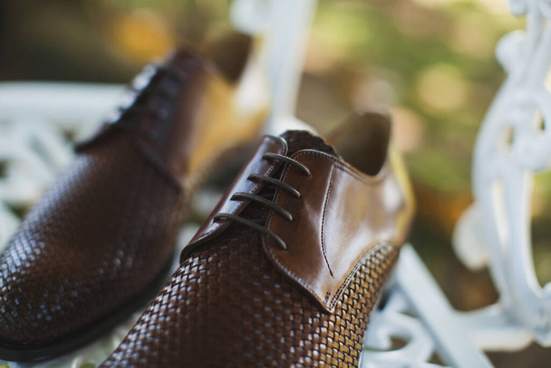 Mens shoes on a chair. The view from the top. - Photo, Image