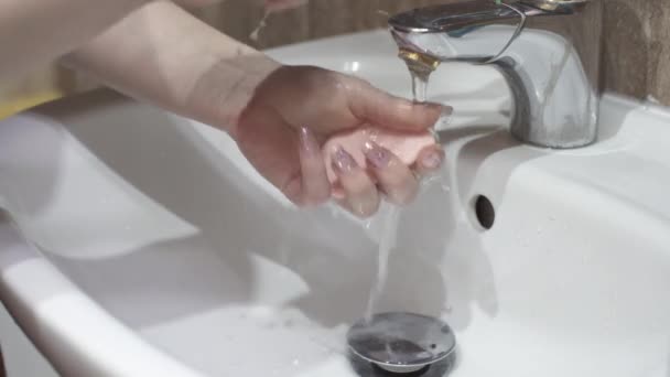 Wash your hands thoroughly with soap and a water jet. - Materiał filmowy, wideo