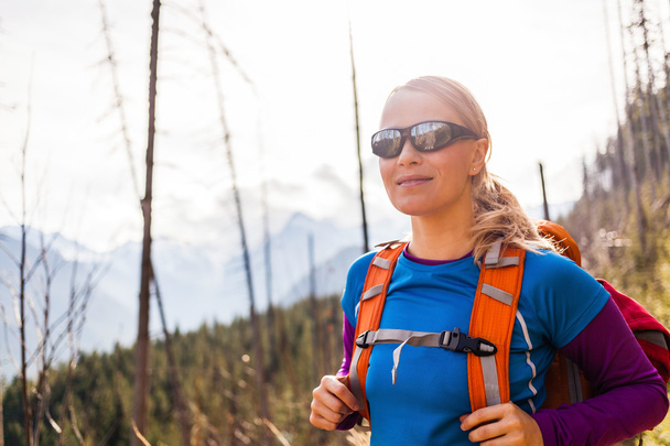 Woman hiking in mountains - Photo, Image