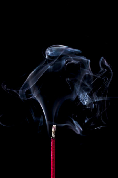 Smoke from the incense stick on black background - Zdjęcie, obraz