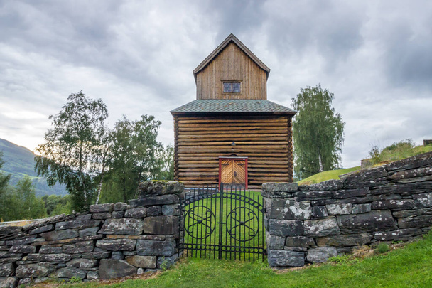 wooden church and cemetery in Ringebu in Norway - Foto, afbeelding