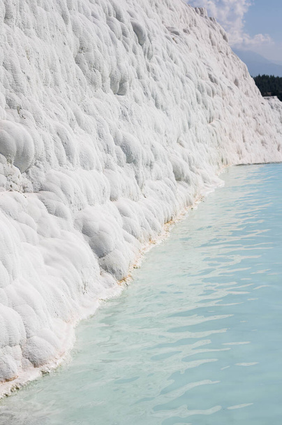 Thermal springs of Pamukkale with terraces and natural pools in Denizli in southwestern Turkey - Photo, Image