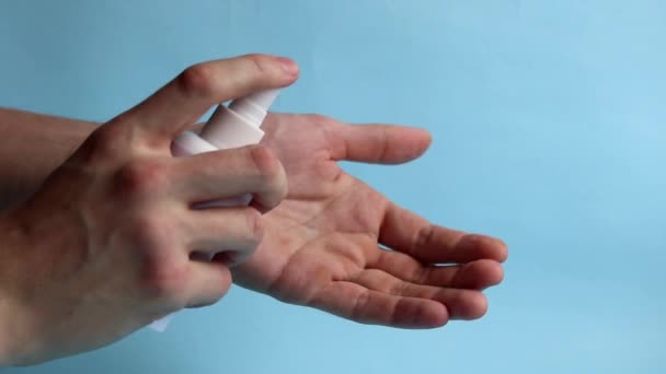 A person uses an antiseptic to clean and disinfect hands. Prevention of viruses, Coronavirus. Hygiene concept hand detail. Purity. - Filmmaterial, Video