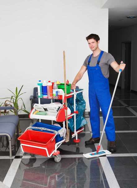 Young Man With Cleaning Equipment - Foto, immagini