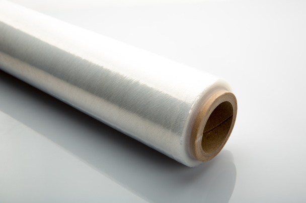 Roll of wrapping plastic stretch film - Foto, afbeelding