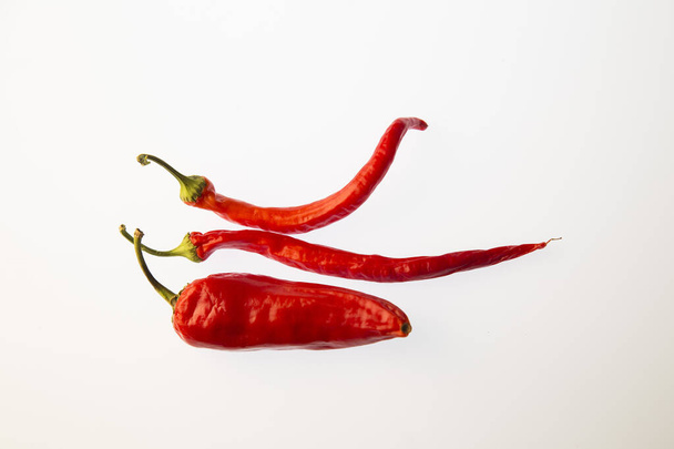 Red pepper on white isolated background - 写真・画像