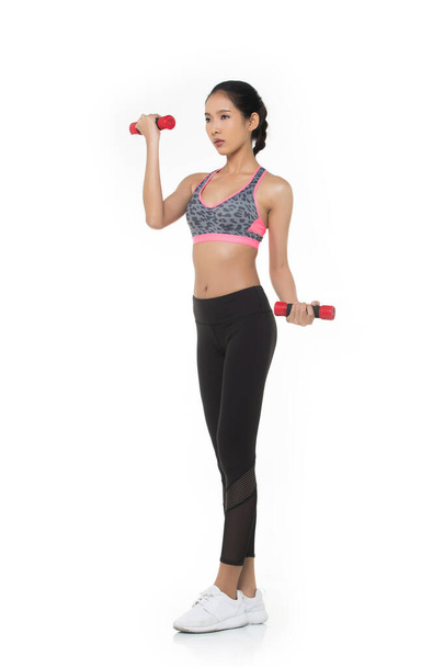 Asian Tan Skin Fitness woman exercise wear pink dark tiger skin boxing suit gear put red dumbbell weight white background, studio lighting copy space isolated, concept Woman Can Do Sport - Φωτογραφία, εικόνα