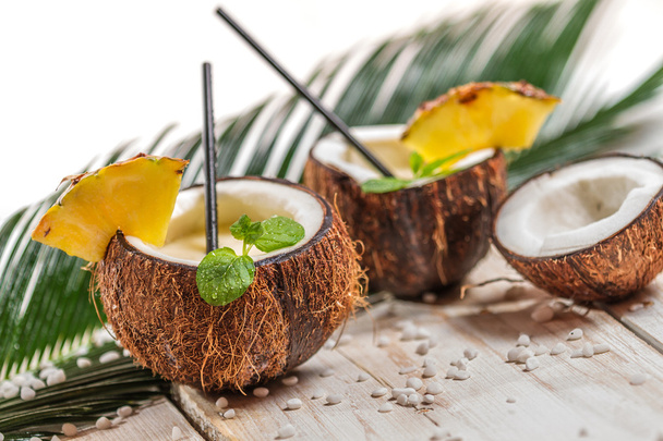 Pinacolada in the coconut with pineapple - Foto, afbeelding