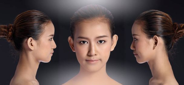 適用後のアジアの女性は、ヘアスタイルを構成します。手の触れようのない滑らかな肌の新鮮な顔。スタジオ照明黒の背景、 3つの顔を比較 - 写真・画像