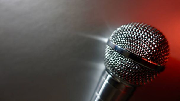 Silver studio microphone . Silver background with copy space - Foto, Bild