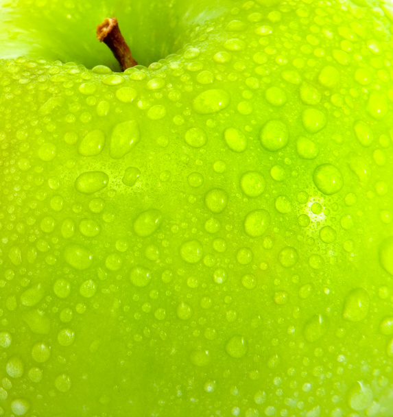 Apple in green with water drops - Photo, Image