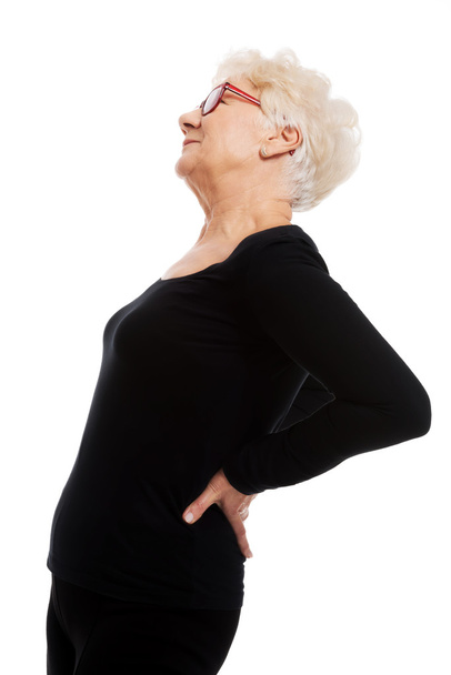 An old woman having a back pain. - Foto, Bild