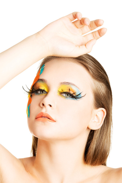 Beautiful woman with abstract make up. - Foto, Imagen