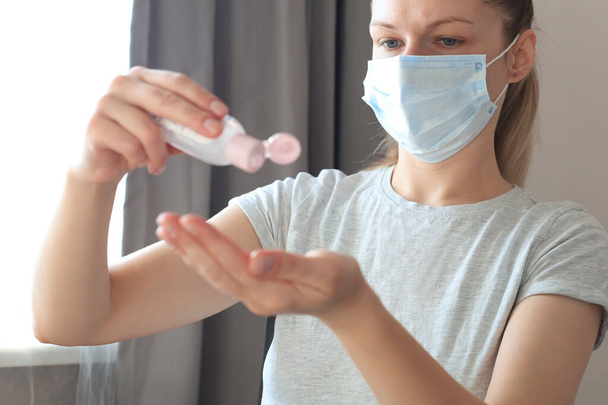 Woman using sanitizer hand gel. Hand hygiene coronavirus protection - Fotó, kép