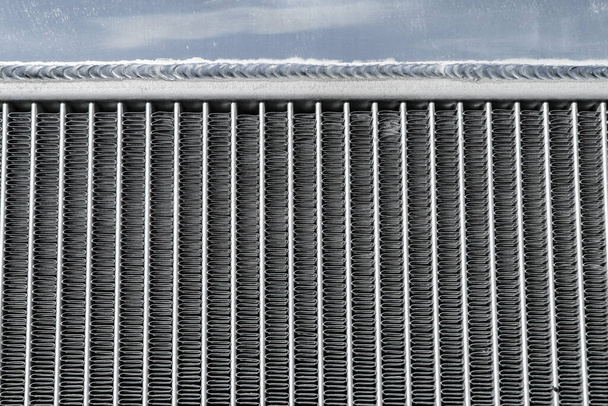 A detail of a ribbing of the cars aluminium sport radiator. - Φωτογραφία, εικόνα