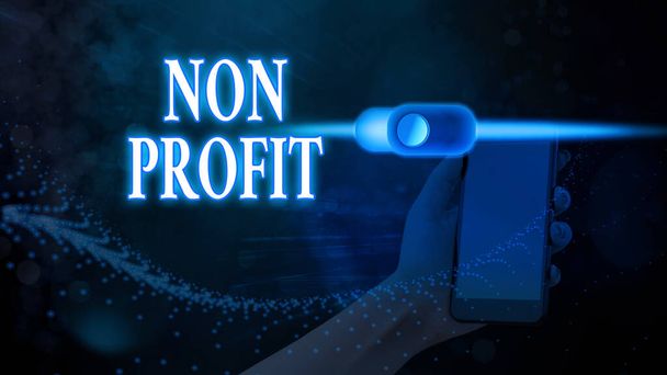A nem profitra mutató szöveges jel. Fogalmi fotó nem tesz vagy végzett elsősorban, hogy a profit szervezet. - Fotó, kép