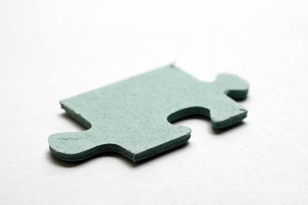 Blue puzzle pieces on white background. - Photo, Image